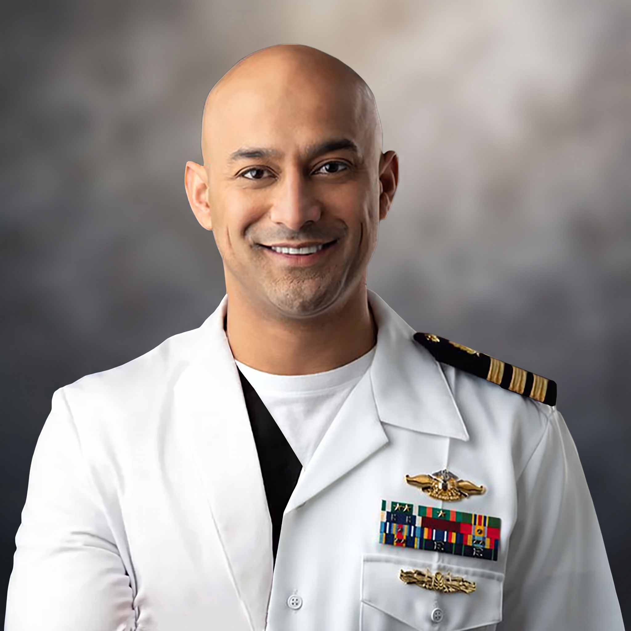 Dr. Kambez Shukoor, DDS, implant and cosmetic dentist and U.S. Navy veteran, at his Washington, DC dental practice